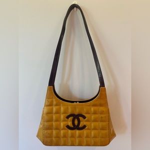 Early 2000s Chanel bag-Patent yellow “cc” bag.